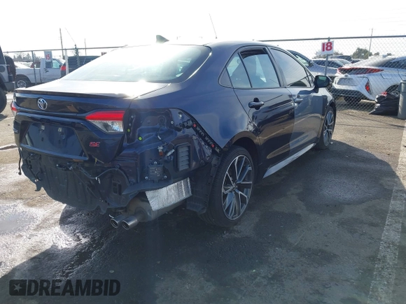 2021 Toyota Corolla SE with VIN 5YFP4MCE5MP082661, listed as a IAAI auction lot 41573579 with 58,418 mi miles and . Bid and sale history available at DreamBid. Image 4.