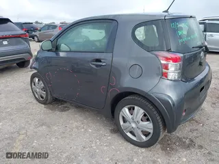 2014 Scion iQ with VIN JTNJJXB03EJ030212, listed as a IAAI auction lot 41091281 with 78,667 mi miles. Bid and sale history available at carsss.com. Image 3.