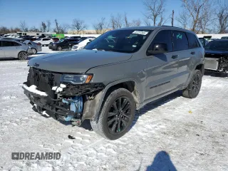 2022 Jeep Grand Cherokee WK Laredo E with VIN 1C4RJFAG3NC117502, listed as a Copart auction lot 45151305 with 62,167 mi miles and Salvage Title. Bid and sale history available at carsss.com. Image 1.