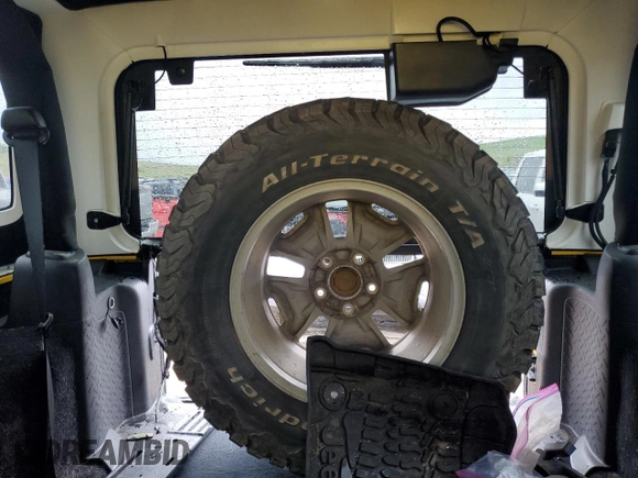 2015 Jeep Wrangler Rubicon with VIN 1C4BJWCG8FL691061, listed as a Copart auction lot 56528213 with 100,927 mi miles and . Bid and sale history available at DreamBid. Image 10.