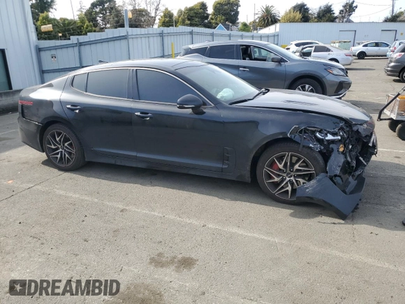 2023 Kia Stinger GT-Line with VIN KNAE35LD7P6125638, listed as a Copart auction lot 50042425 with 57,029 mi miles and Salvage Title. Bid and sale history available at carsss.com. Image 4.
