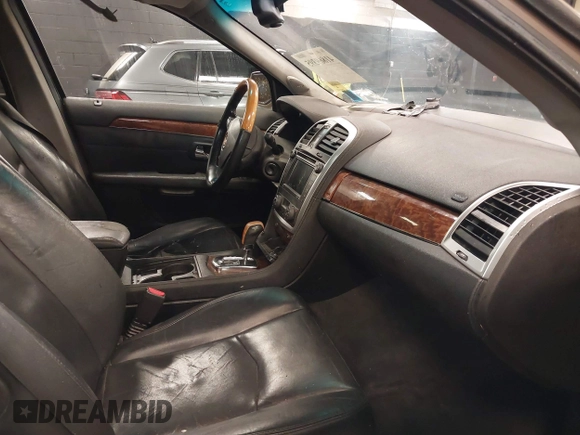 2007 Cadillac SRX with VIN 1GYEE637370137893, listed as a IAAI auction lot 41869395 with 215,460 mi miles. Bid and sale history available at carsss.com. Image 5.