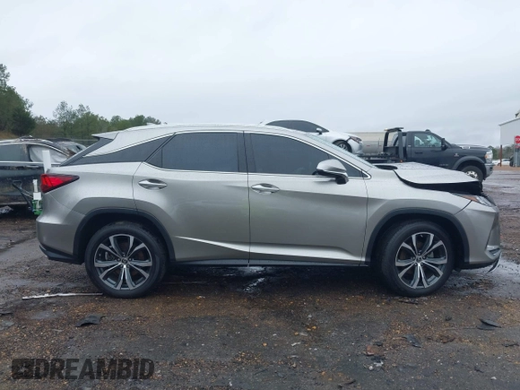 2021 Lexus RX with VIN 2T2HZMDA0MC289343, listed as a IAAI auction lot 41556887 with 42,273 mi miles. Bid and sale history available at carsss.com. Image 12.