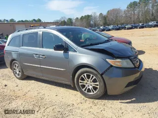 2012 Honda Odyssey EX-L with VIN 5FNRL5H64CB066240, listed as a IAAI auction lot 41792321 with 186,895 mi miles. Bid and sale history available at carsss.com. Image 1.