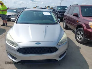 2015 Ford Focus SE z VIN 1FADP3F21FL348863, wystawiony jako IAAI lot #42401820 z przebiegiem 126 329 mil mil oraz . Historia ofert i sprzedaży dostępna na DreamBid. Obrazek 12.