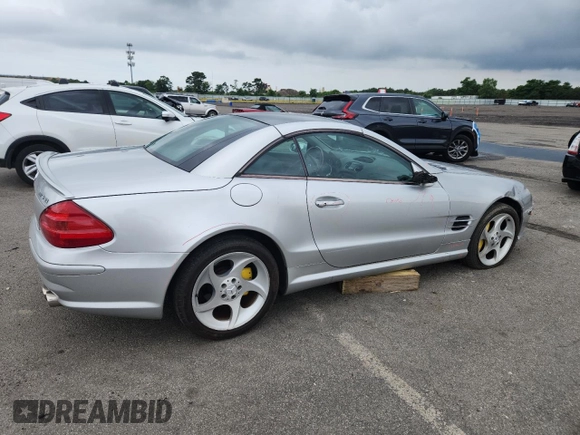 2005 Mercedes-Benz SL 500 with VIN WDBSK75F65F093215, listed as a Copart auction lot 63744135 with 94,645 mi miles and Salvage title. Bid and sale history available at DreamBid. Image 3.