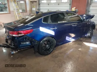 2016 Kia Optima LX with VIN 5XXGT4L33GG026572, listed as a IAAI auction lot 41514872 with 135,423 mi miles. Bid and sale history available at carsss.com. Image 4.