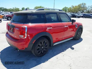 2019 MINI Countryman Cooper S with VIN WMZYT3C55K3E97750, listed as a IAAI auction lot 41844596 with 34,871 mi miles and . Bid and sale history available at DreamBid. Image 4.
