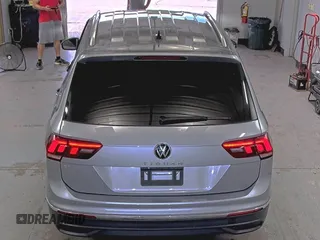 2024 Volkswagen Tiguan SE with VIN 3VV3B7AX9RM084536, listed as a IAAI auction lot 42708274 with 33,250 mi miles and . Bid and sale history available at DreamBid. Image 1.