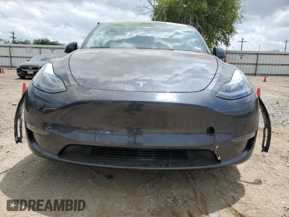 2024 Tesla Model Y Long Range with VIN 7SAYGDEE4RA316722, listed as a Copart auction lot 53207395 with 17,006 mi miles and Salvage title. Bid and sale history available at DreamBid. Image 5.