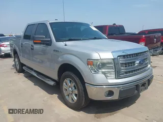 2014 Ford F-150 XL with VIN 1FTFW1CF9EKG57115, listed as a IAAI auction lot 42272211 with 165,421 mi miles and . Bid and sale history available at DreamBid. Image 1.