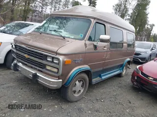 1995 Chevrolet Chevy Van z VIN 1GBEG25K8SF245639, wystawiony jako IAAI lot #41917862 z przebiegiem 89 015 mil mil oraz . Historia ofert i sprzedaży dostępna na DreamBid. Obrazek 2.