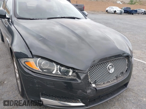 2013 Jaguar XF I4 RWD with VIN SAJWA0ES0DPS64027, listed as a IAAI auction lot 41569121 with 103,115 mi miles. Bid and sale history available at carsss.com. Image 6.