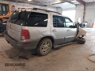 2005 Mercury Mountaineer Convenience z VIN 4M2ZU86E35UJ14209, wystawiony jako IAAI lot #42172836 z przebiegiem 216 964 mil mil oraz . Historia ofert i sprzedaży dostępna na DreamBid. Obrazek 4.