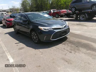 2018 Toyota Avalon Hybrid XLE Plus z VIN 4T1BD1EB1JU062378, wystawiony jako IAAI lot #41988148 z przebiegiem 128 220 mil mil oraz . Historia ofert i sprzedaży dostępna na DreamBid. Obrazek 1.
