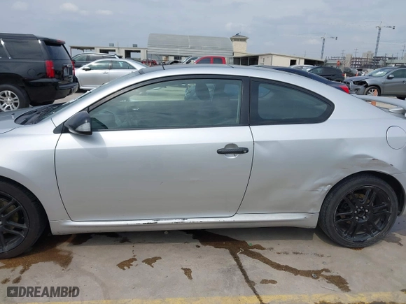 2006 Scion tC with VIN JTKDE177960125897, listed as a IAAI auction lot 41964589 with 215,443 mi miles. Bid and sale history available at carsss.com. Image 14.