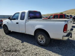 1998 Ford F-150 with VIN 1FTZX1720WKA20813, listed as a Copart auction lot 63852215 with 215,729 mi miles and Salvage title. Bid and sale history available at DreamBid. Image 2.