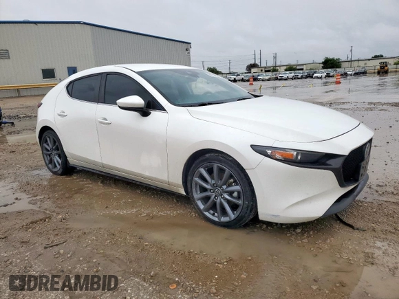 2019 Mazda 3 with VIN JM1BPBJM2K1136404, listed as a Copart auction lot 60378665 with 61,903 mi miles and Salvage title. Bid and sale history available at DreamBid. Image 4.