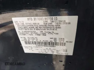 2014 Ford Taurus Limited with VIN 1FAHP2F80EG104984, listed as a IAAI auction lot 41910463 with 174,034 mi miles. Bid and sale history available at carsss.com. Image 9.