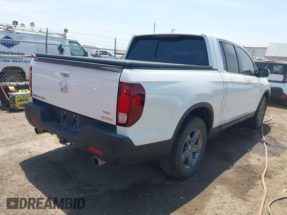 2023 Honda Ridgeline RTL z VIN 5FPYK3F51PB028295, wystawiony jako IAAI lot #42031783 z przebiegiem 39 228 mil mil oraz . Historia ofert i sprzedaży dostępna na DreamBid. Obrazek 4.