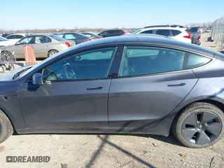 2023 Tesla Model 3 with VIN 5YJ3E1EA3PF678825, listed as a IAAI auction lot 41283153 with 8,607 mi miles. Bid and sale history available at carsss.com. Image 14.