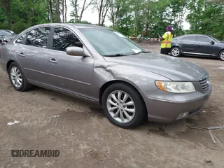 2006 Hyundai Azera SE with VIN KMHFC46F56A089678, listed as a IAAI auction lot 42449327 with 97,475 mi miles and . Bid and sale history available at DreamBid. Image 1.