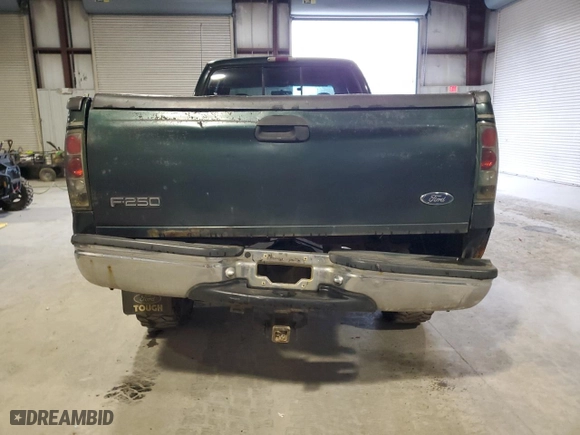 1999 Ford Super Duty F-250 XL with VIN 1FTNX21S9XEB03346, listed as a Copart auction lot 80881684 with 239,122 mi miles and Clean Title. Bid and sale history available at carsss.com. Image 6.