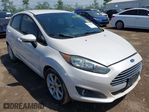 2016 Ford Fiesta SE z VIN 3FADP4EJ7GM137469, wystawiony jako IAAI lot #42278469 z przebiegiem 98 731 mil mil oraz . Historia ofert i sprzedaży dostępna na DreamBid. Obrazek 1.
