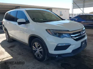 2018 Honda Pilot EX-L with VIN 5FNYF5H54JB009785, listed as a IAAI auction lot 41667784 with 67,296 mi miles. Bid and sale history available at carsss.com. Image 1.