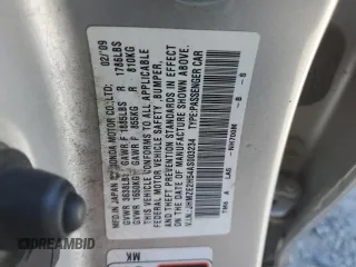 2010 Honda Insight LX z VIN JHMZE2H54AS003234, wystawiony jako Copart lot #56915385 z przebiegiem 320 644 mil mil oraz Czysty tytuł • Clean title. Historia ofert i sprzedaży dostępna na DreamBid. Obrazek 13.