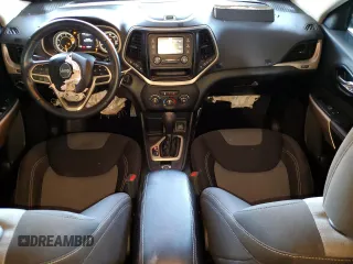 2017 Jeep Cherokee Altitude with VIN 1C4PJLAB3HW661754, listed as a Copart auction lot 64580105 with 62,427 mi miles and Salvage title. Bid and sale history available at DreamBid. Image 8.