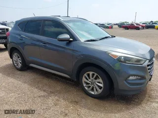 2017 Hyundai Tucson SE Plus with VIN KM8J33A42HU375273, listed as a IAAI auction lot 41900474 with 124,658 mi miles. Bid and sale history available at carsss.com. Image 1.