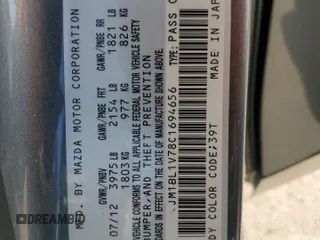 2012 Mazda 3 i Touring with VIN JM1BL1V78C1694656, listed as a Copart auction lot 51860975 with 146,193 mi miles and Salvage Title. Bid and sale history available at DreamBid. Image 13.