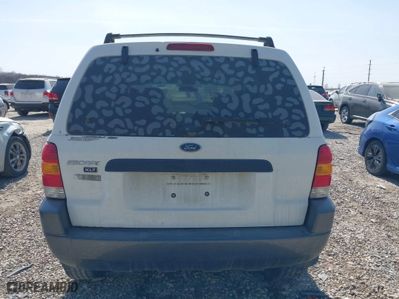 2004 Ford Escape XLT with VIN 1FMYU93164KA96674, listed as a IAAI auction lot 41780474 with 182,525 mi miles. Bid and sale history available at carsss.com. Image 16.