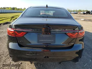 2021 Jaguar XF R-Dynamic SE with VIN SAJBL4GX2MCY89142, listed as a Copart auction lot 50455035 with 81,184 mi miles and Salvage Title. Bid and sale history available at carsss.com. Image 6.