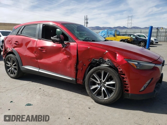 2017 Mazda CX-3 Grand Touring z VIN JM1DKFD74H0167026, wystawiony jako Copart lot #48817725 z przebiegiem 84 053 mil mil oraz Szkody całkowita. Historia ofert i sprzedaży dostępna na DreamBid. Obrazek 4.