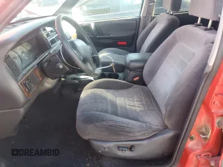 1997 Jeep Grand Cherokee Laredo with VIN 1J4GZ58S1VC760400, listed as a Copart auction lot 43932815 with 108,112 mi miles and Salvage Title. Bid and sale history available at carsss.com. Image 7.
