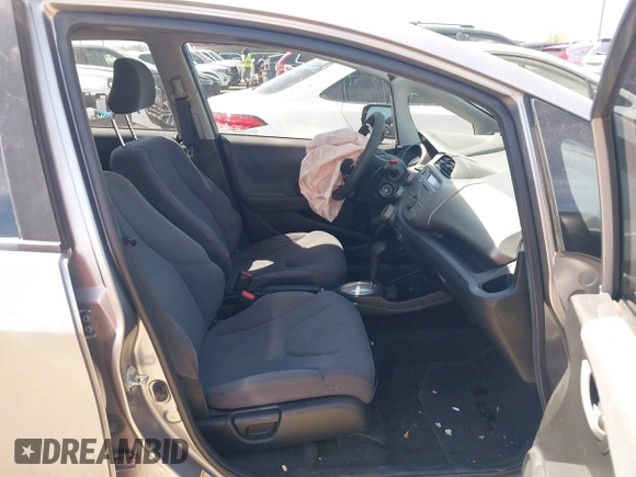 2009 Honda Fit with VIN JHMGE88249S036133, listed as a IAAI auction lot 41788358 with 128,613 mi miles. Bid and sale history available at carsss.com. Image 5.