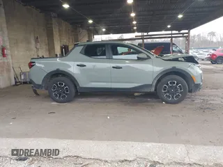 2024 Hyundai Santa Cruz SEL z VIN 5NTJBDDE6RH120060, wystawiony jako IAAI lot #42027494 z przebiegiem 10 075 mil mil oraz . Historia ofert i sprzedaży dostępna na DreamBid. Obrazek 13.