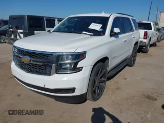 2015 Chevrolet Tahoe LS with VIN 1GNSCAKCXFR748554, listed as a IAAI auction lot 41765865 with 160,282 mi miles and . Bid and sale history available at DreamBid. Image 17.