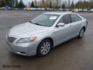 2007 Toyota Camry Hybrid with VIN JTNBB46K673021121, listed as a IAAI auction lot 41988725 with 266,907 mi miles. Bid and sale history available at carsss.com. Image 2.