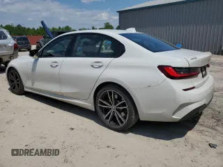 2022 BMW 3 Series 330i with VIN 3MW5R1J06N8C31334, listed as a Copart auction lot 52724395 with 36,445 mi miles and Salvage Title. Bid and sale history available at carsss.com. Image 2.