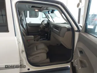 2010 Jeep Commander Sport with VIN 1J4RG4GT7AC130135, listed as a IAAI auction lot 42436053 with 103,482 mi miles and . Bid and sale history available at DreamBid. Image 5.