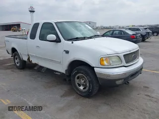 2003 Ford F-150 XL with VIN 1FTRX18L73NB72735, listed as a IAAI auction lot 42016567 with 0 mi miles. Bid and sale history available at carsss.com. Image 1.