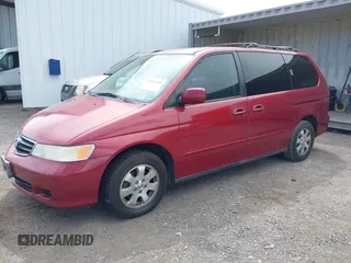 2003 Honda Odyssey EX with VIN 5FNRL18643B086576, listed as a IAAI auction lot 41991328 with 130,025 mi miles and . Bid and sale history available at carsss.com. Image 2.