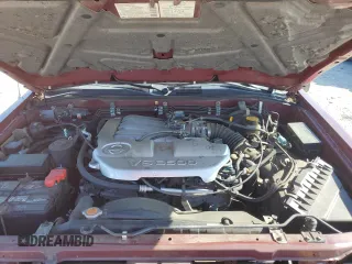 2002 Nissan Pathfinder SE z VIN JN8DR09Y02W719639, wystawiony jako Copart lot #53619955 z przebiegiem 117 174 mil mil oraz Szkoda całkowita • Salvage title. Historia ofert i sprzedaży dostępna na DreamBid. Obrazek 12.
