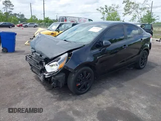 2014 Kia Rio LX with VIN KNADM4A33E6335499, listed as a IAAI auction lot 42123085 with 148,146 mi miles and . Bid and sale history available at DreamBid. Image 17.