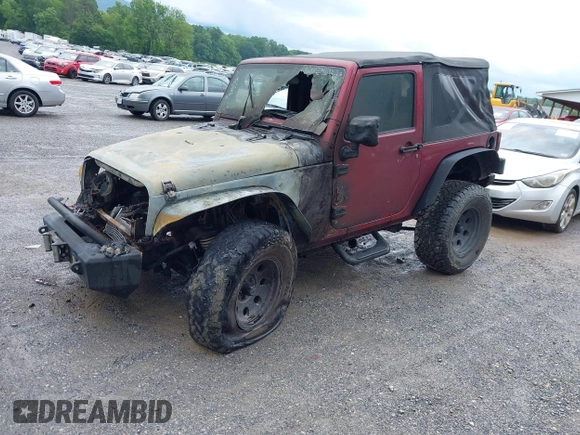 2012 Jeep Wrangler Sport with VIN 1C4AJWAG9CL203018, listed as a IAAI auction lot 42377899 with Not provided miles and . Bid and sale history available at DreamBid. Image 2.