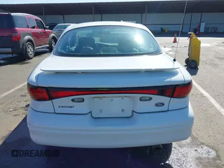 2000 Ford Escort ZX2 z VIN 3FAKP1134YR161407, wystawiony jako IAAI lot #42199401 z przebiegiem 150 611 mil mil oraz . Historia ofert i sprzedaży dostępna na DreamBid. Obrazek 16.