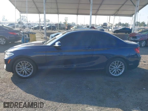 2015 BMW 2 Series 228i xDrive with VIN WBA1F7C5XFV367287, listed as a IAAI auction lot 40802463 with 113,427 mi miles and . Bid and sale history available at carsss.com. Image 14.